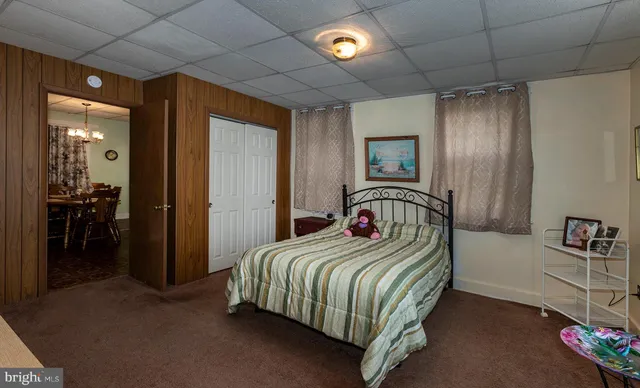 a view of livingroom with furniture and toys