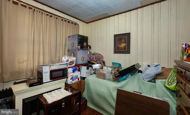 a view of a room with lots of gym equipment