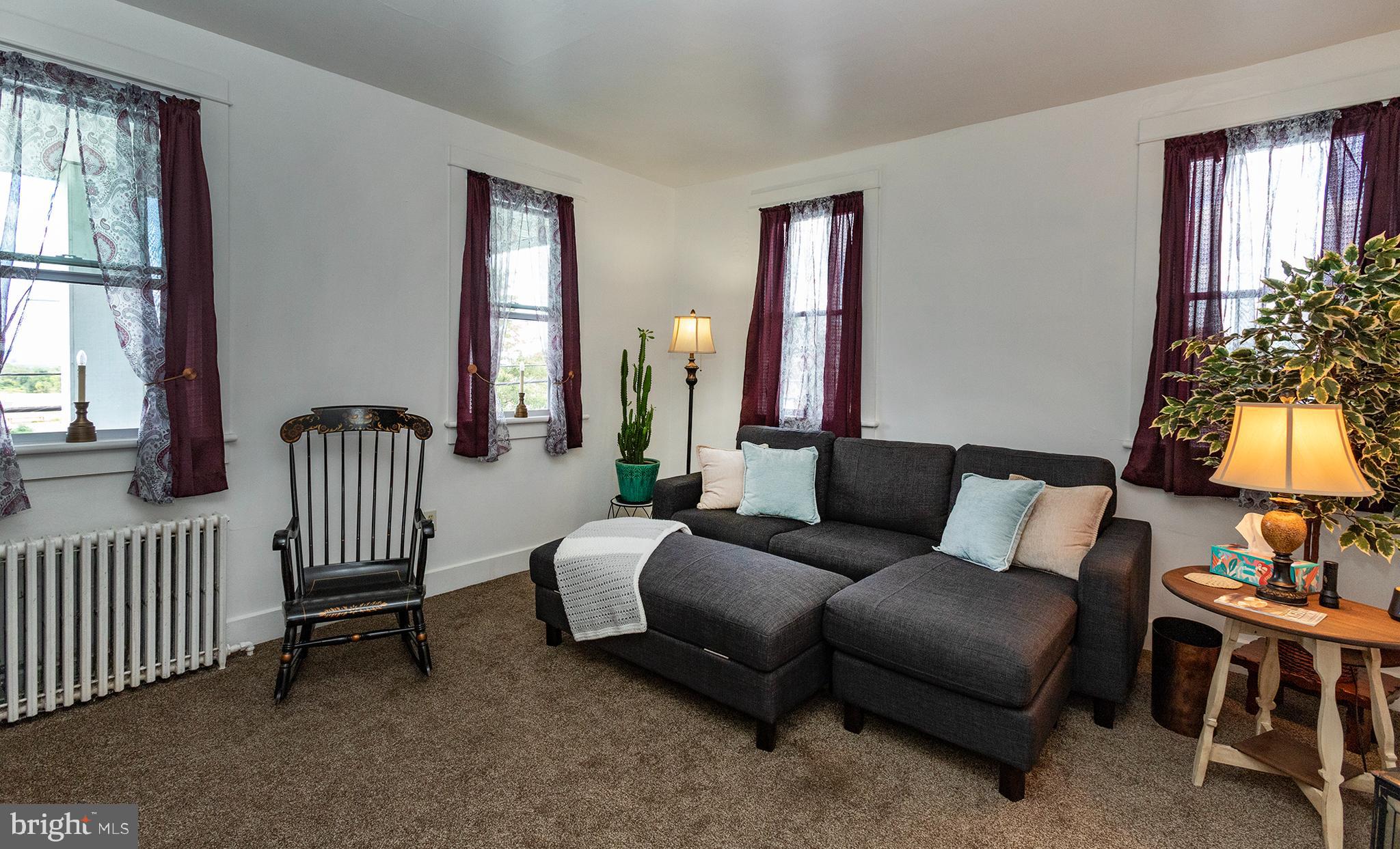 100 West Broad Street Elizabethville, PA 17023 - Photo 47 of 89 a living room with furniture and a flat screen tv