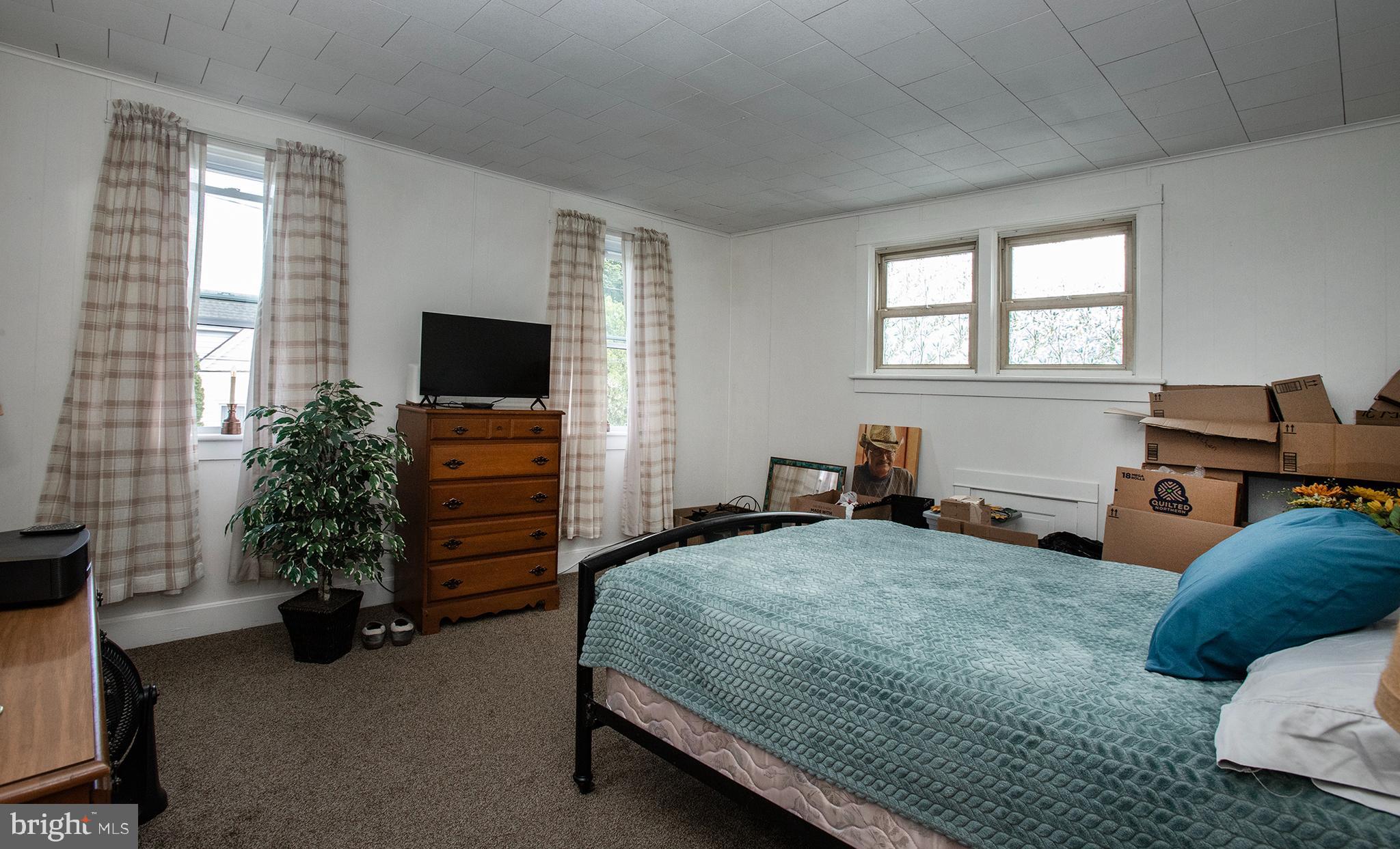 100 West Broad Street Elizabethville, PA 17023 - Photo 51 of 89 a bedroom with a bed and a television