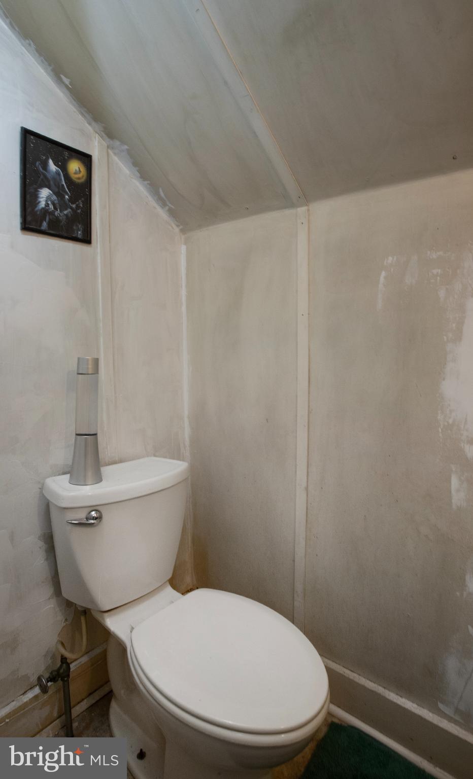 100 West Broad Street Elizabethville, PA 17023 - Photo 69 of 89 a white toilet sitting next to a shower curtain