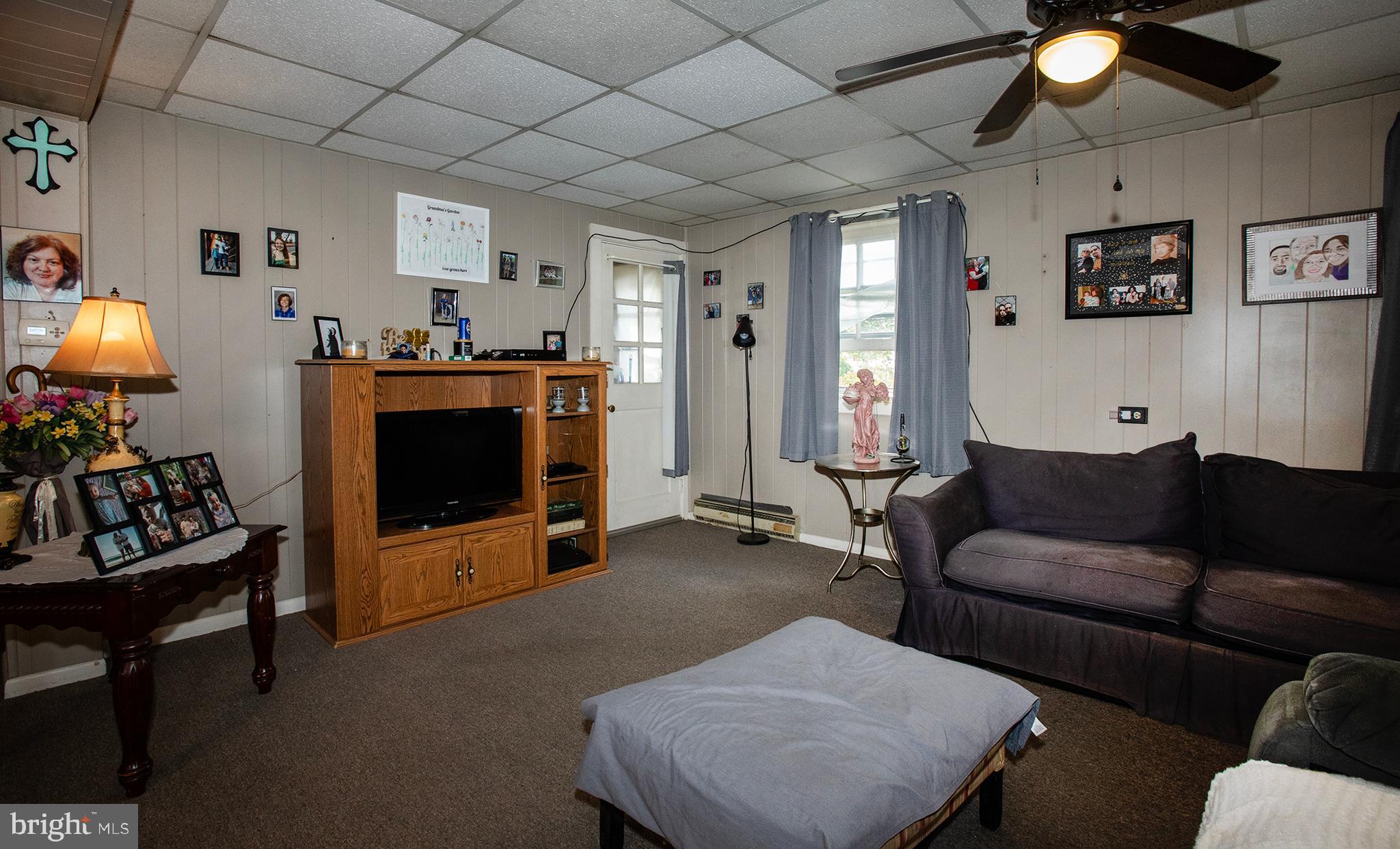 100 West Broad Street Elizabethville, PA 17023 - Photo 79 of 89 a living room with furniture and a fireplace