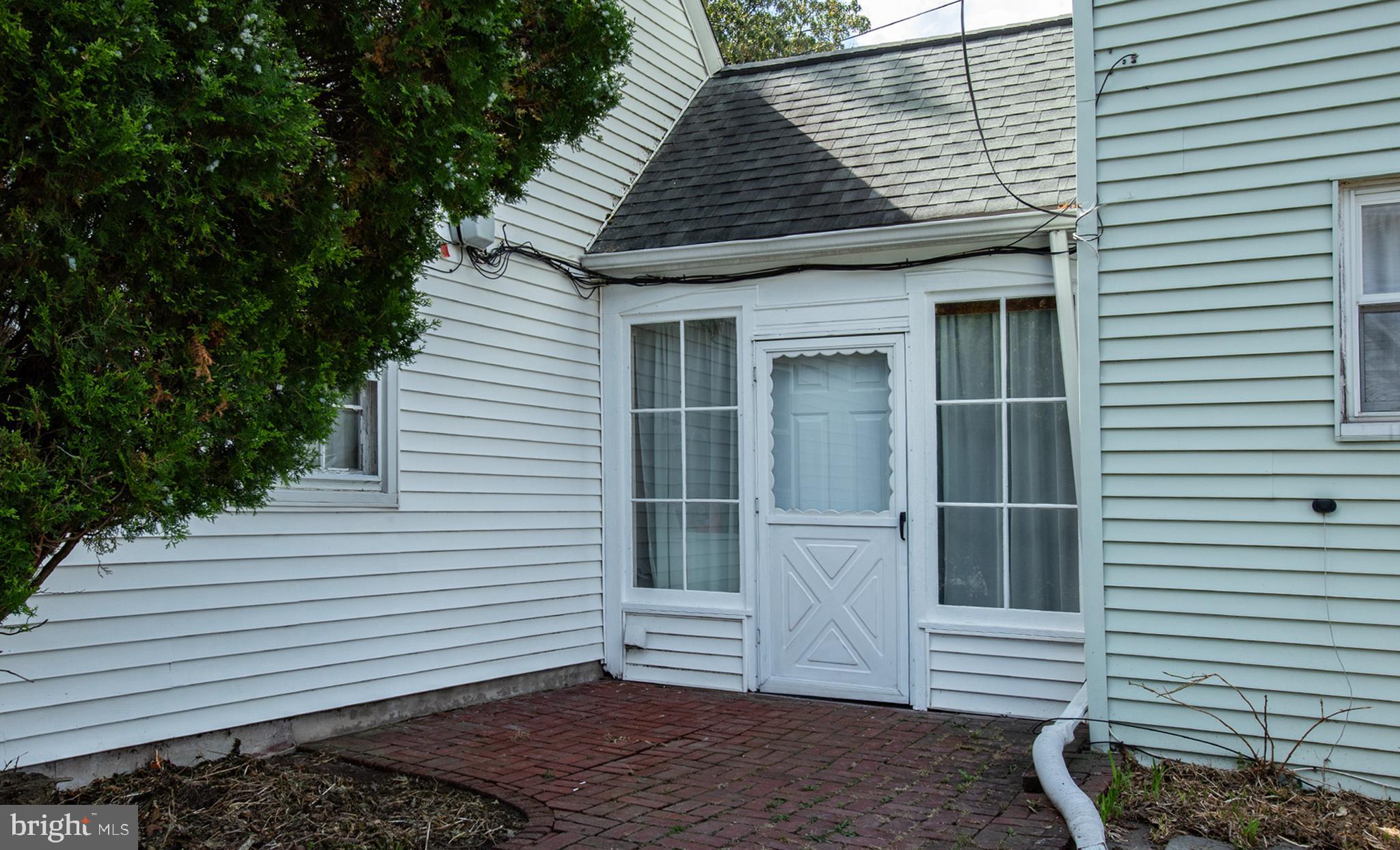 100 West Broad Street Elizabethville, PA 17023 - Photo 10 of 89 a view of a house with a yard and garage