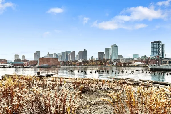 a view of a city with tall buildings