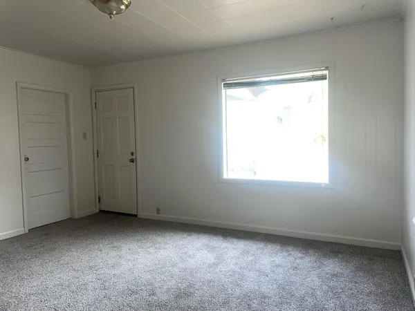 a kitchen with a sink stove and refrigerator