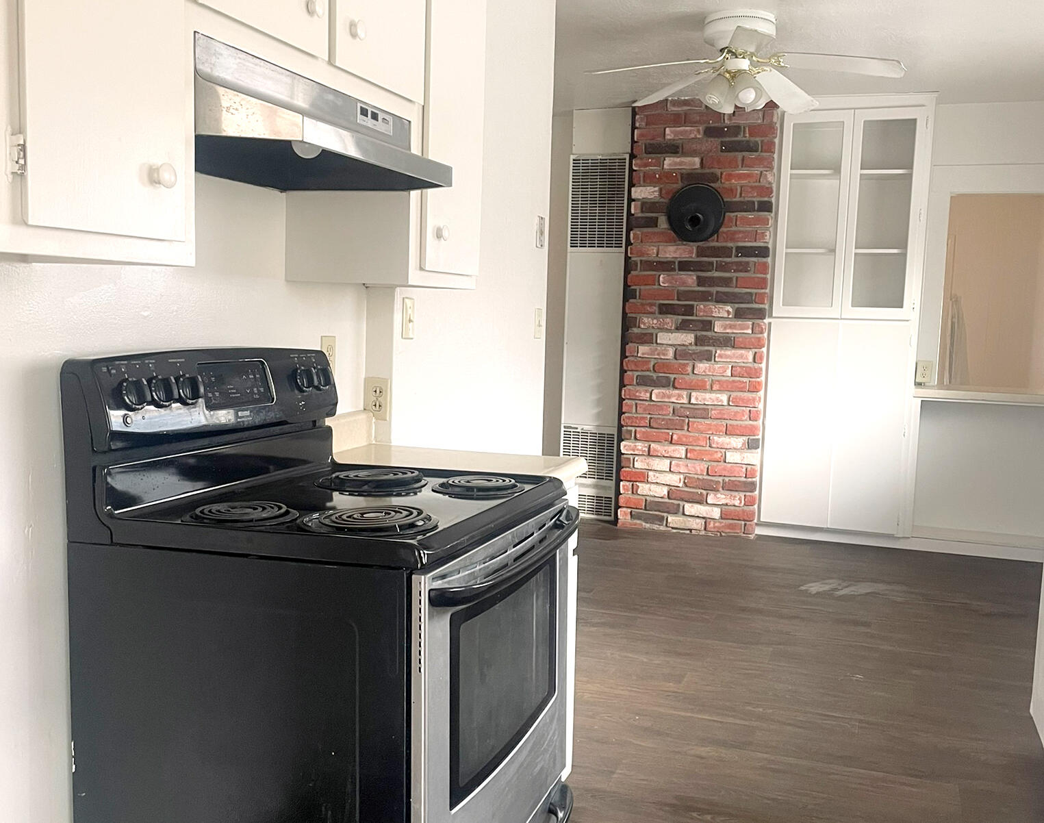 40 Foss Street Susanville, CA 96130 - Photo 19 of 38 a kitchen with a stove and a microwave