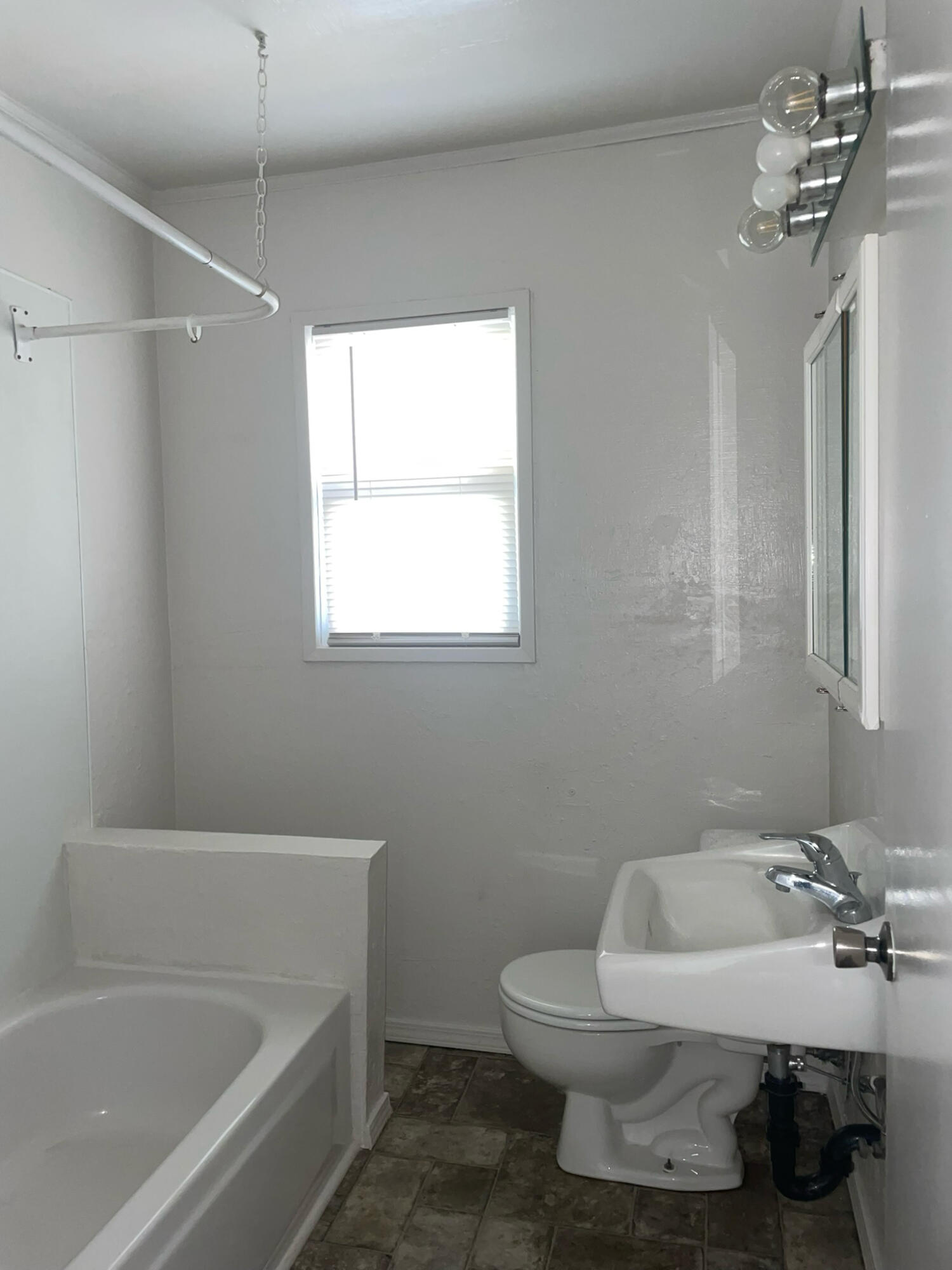 40 Foss Street Susanville, CA 96130 - Photo 23 of 38 a bathroom with a sink toilet and bathtub