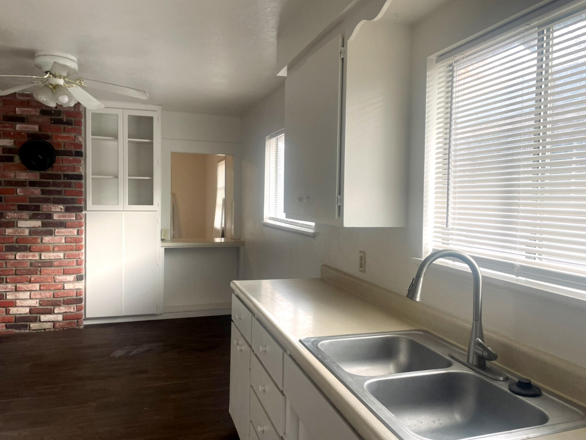 40 Foss Street Susanville, CA 96130 - Photo 26 of 45 a kitchen with a sink and wooden floor