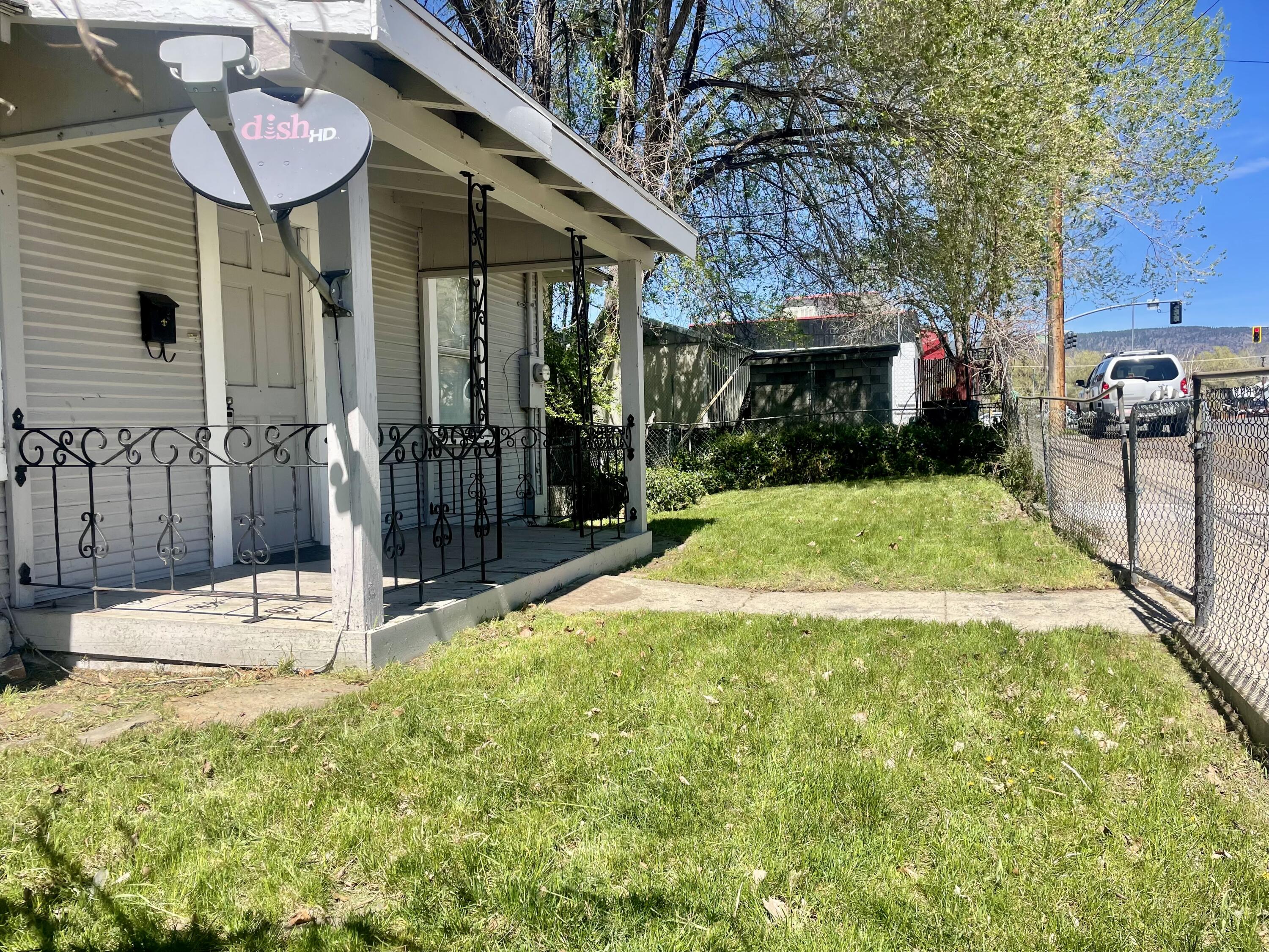 40 Foss Street Susanville, CA 96130 - Photo 45 of 45 a view of a house with backyard and sitting area