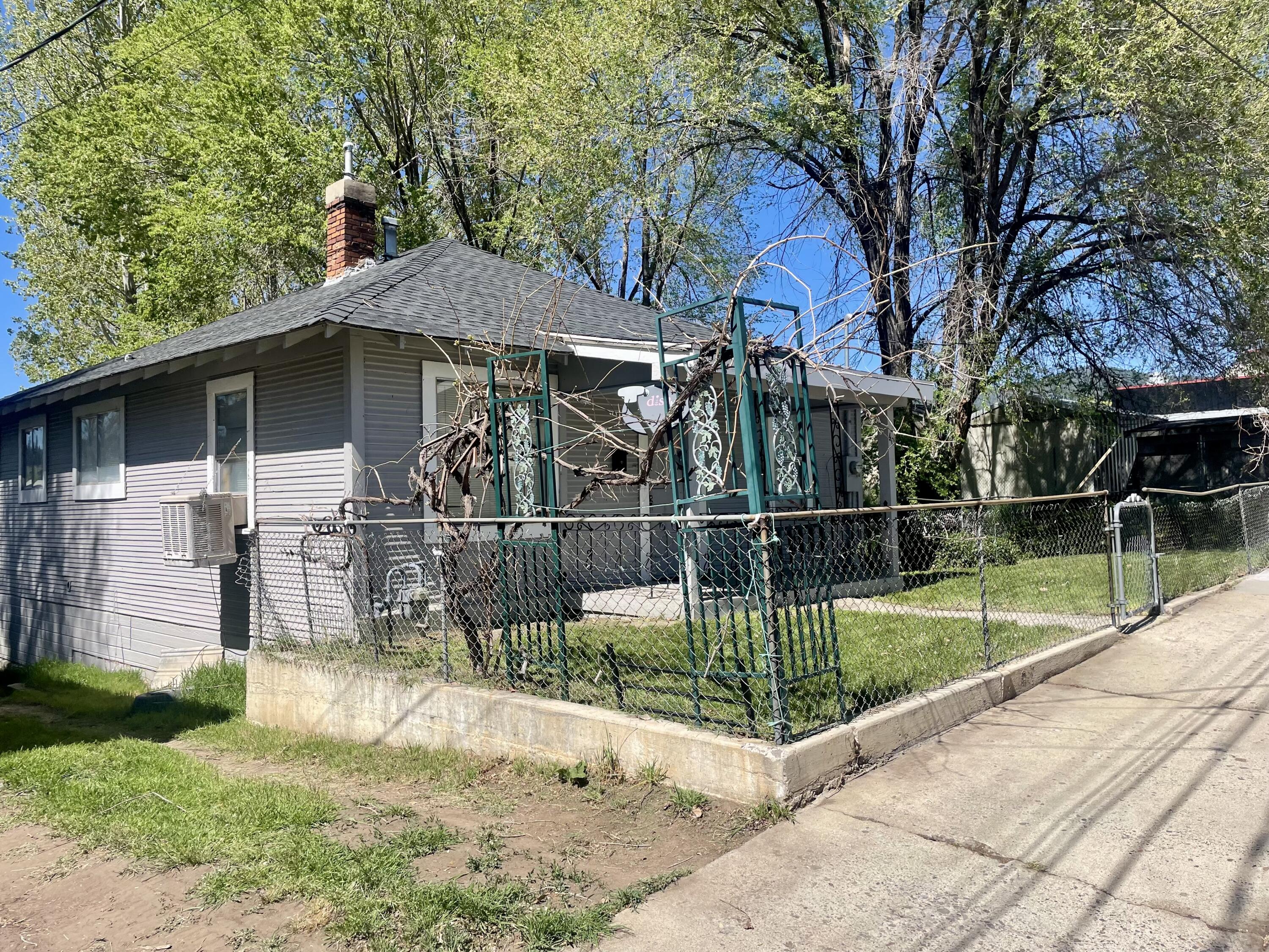 40 Foss Street Susanville, CA 96130 - Photo 5 of 45 a view of a yard with wooden fence