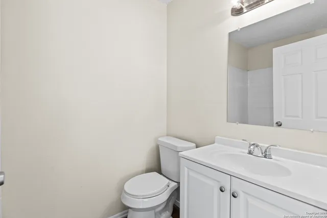 a bathroom with a sink and a toilet