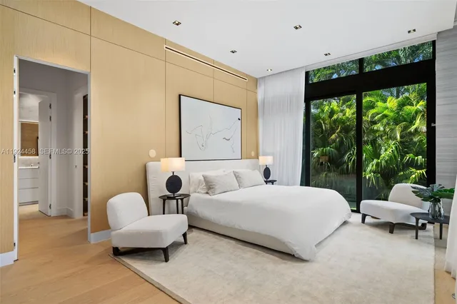 a bathroom with a sink and a large mirror