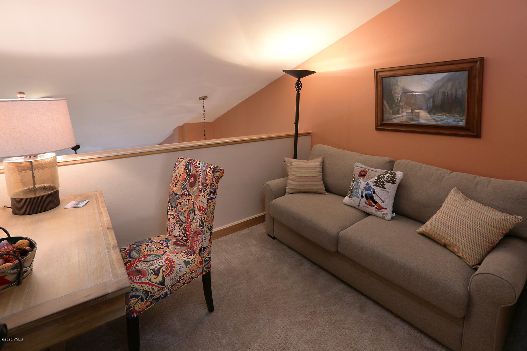 137 Benchmark Road, Unit 520 Avon, CO 81620 - Photo 17 of 22 a living room with furniture and wooden floor