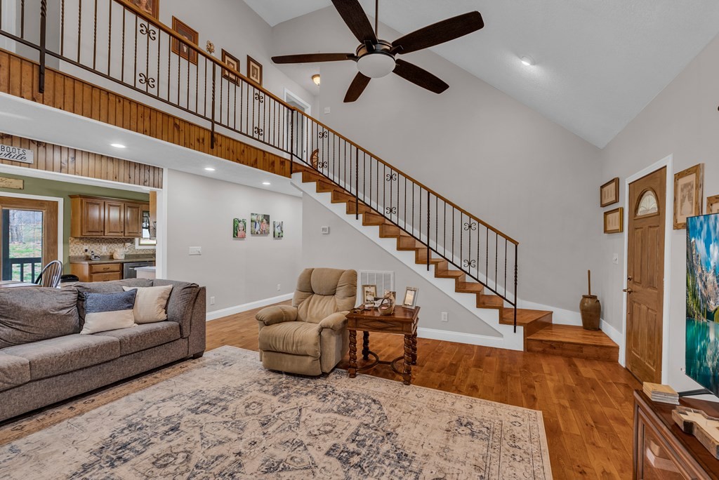 465 Hickory Lane Sparta, TN 38583 - Photo 24 of 46 a living room with furniture or stairs and a wooden floor