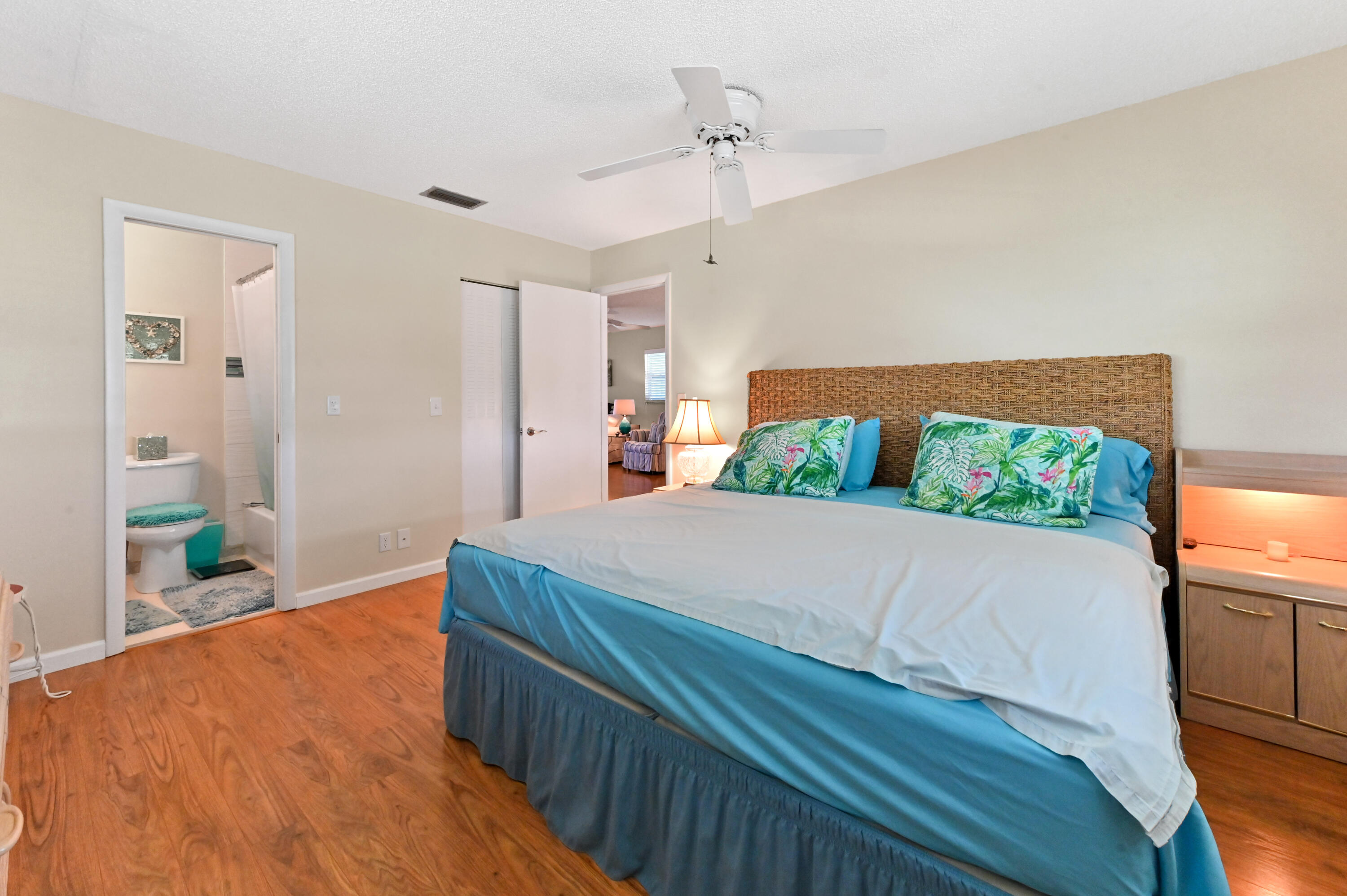 604 Hummingbird Lane Delray Beach, FL 33445 - Photo 14 of 32 a bedroom with a bed and window