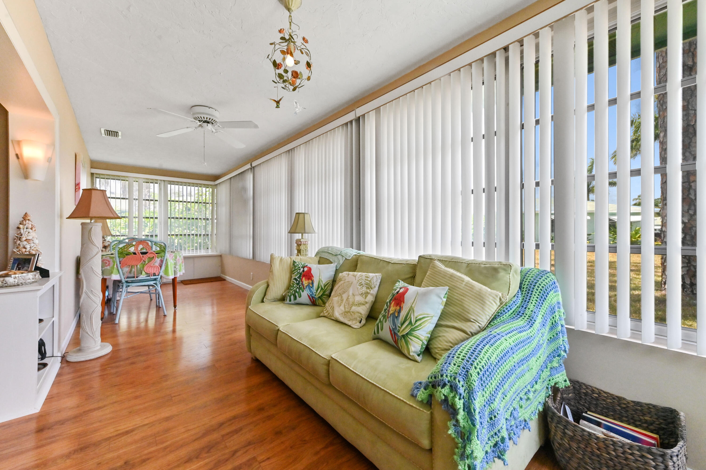 604 Hummingbird Lane Delray Beach, FL 33445 - Photo 20 of 32 a living room with furniture and wooden floor