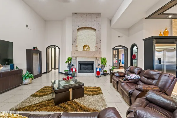 a kitchen with stainless steel appliances granite countertop a stove and cabinets