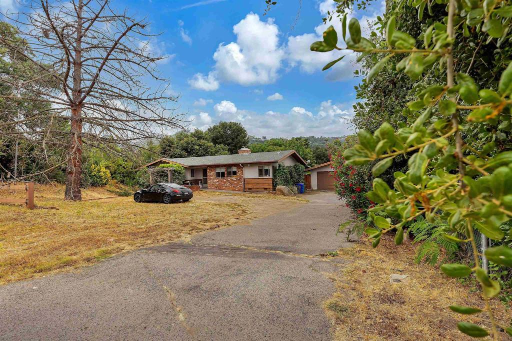 27332 Oakmont Road Valley Center, CA 92082 - Photo 1 of 1 a view of a house with a yard