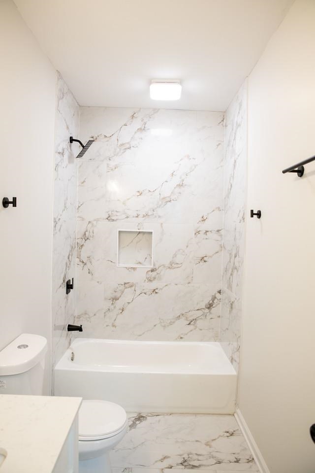 4103 Orleans Road Memphis, TN 38116 - Photo 19 of 32 a bathroom with a bathtub and a toilet