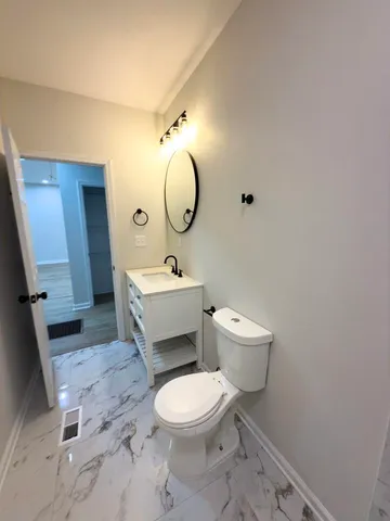 a view of small space with wooden floor