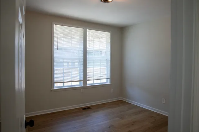 a bathroom with a bathtub and a toilet