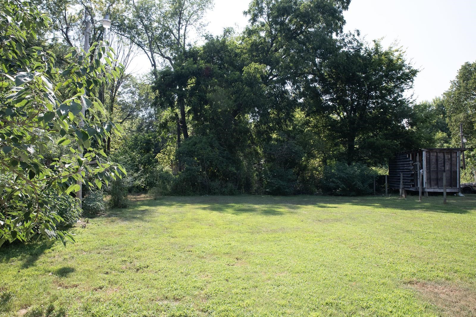 4103 Orleans Road Memphis, TN 38116 - Photo 27 of 32 a view of a swimming pool with an outdoor space and seating area