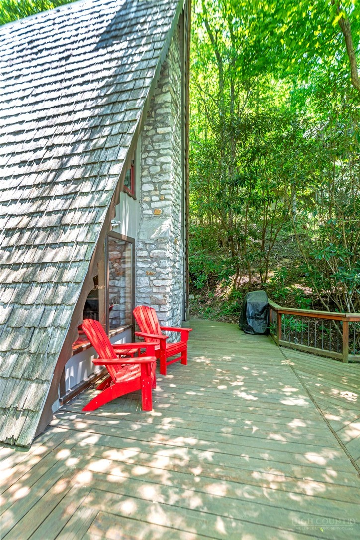268 Cherry Drive Boone, NC 28607 - Photo 23 of 29 a view of swimming pool with a bench in front of house