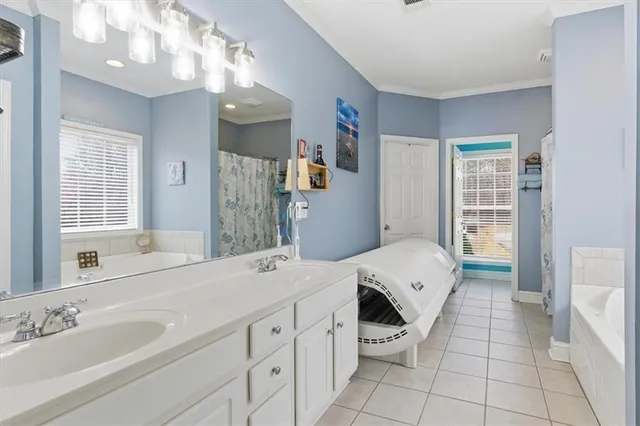 a bathroom with a bathtub and a shower