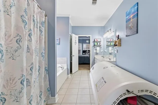 a bathroom with a double vanity sink and a mirror
