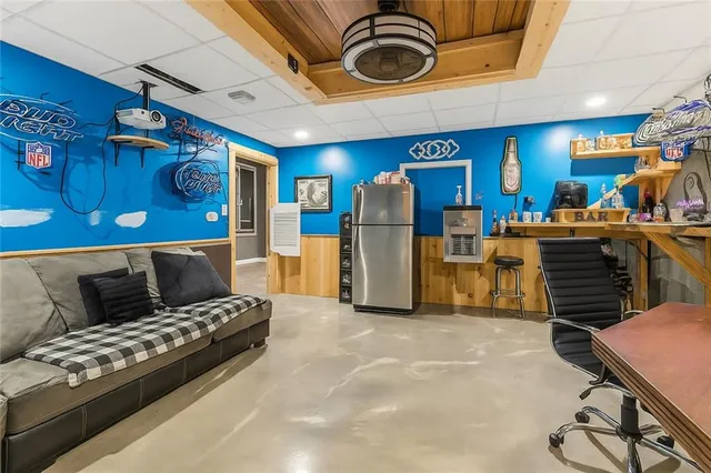 a bathroom with a toilet sink and shower