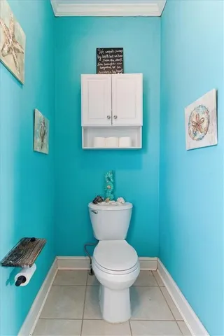 a view of walk in closet with clothes