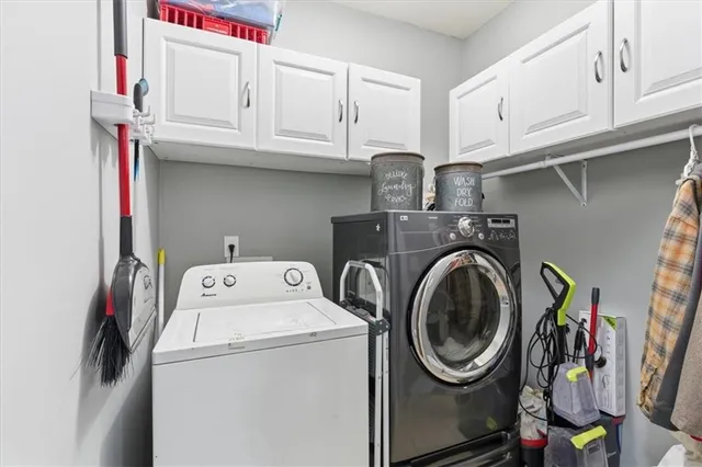 a view of a backyard with wooden fence