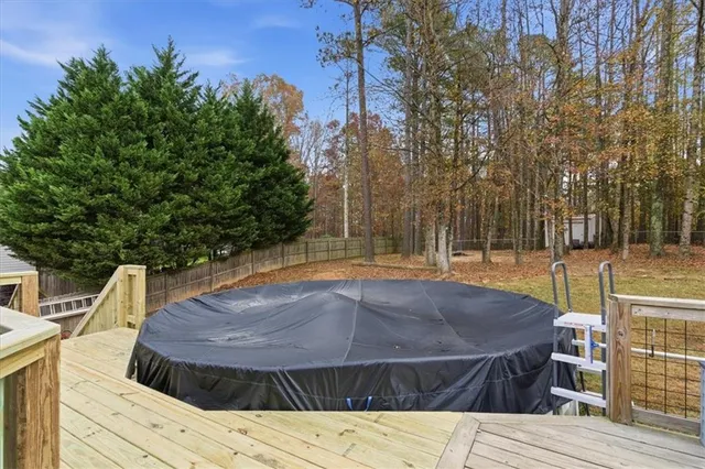 a view of a house with swimming pool
