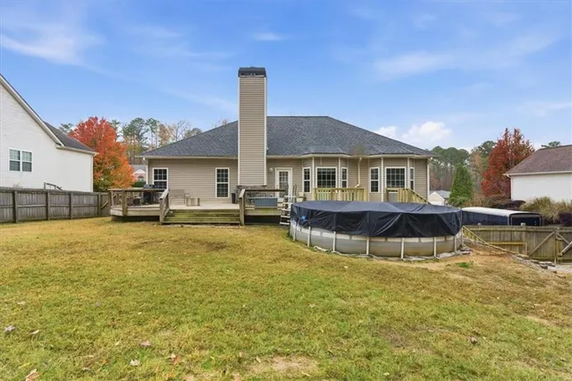 a backyard of a house with lots of green space