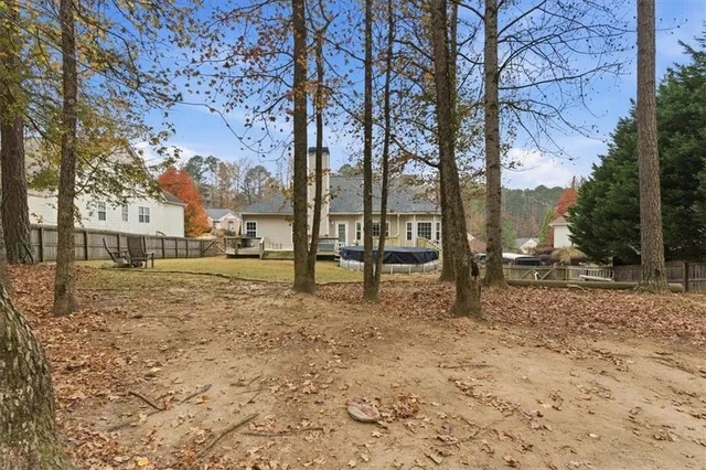 a backyard of a house with lots of green space