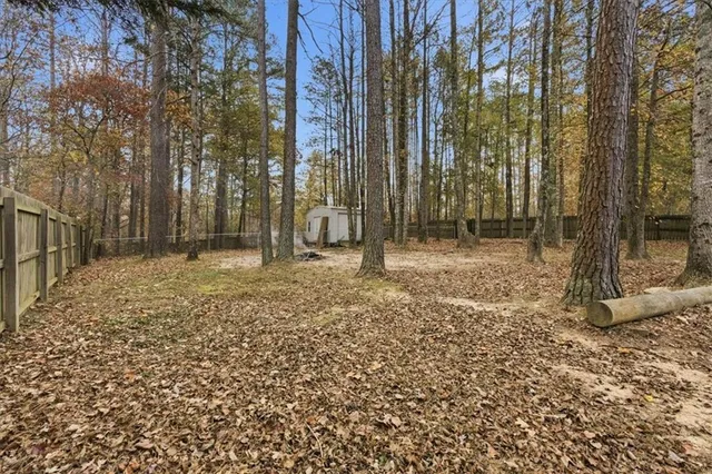 a view of lake with green space