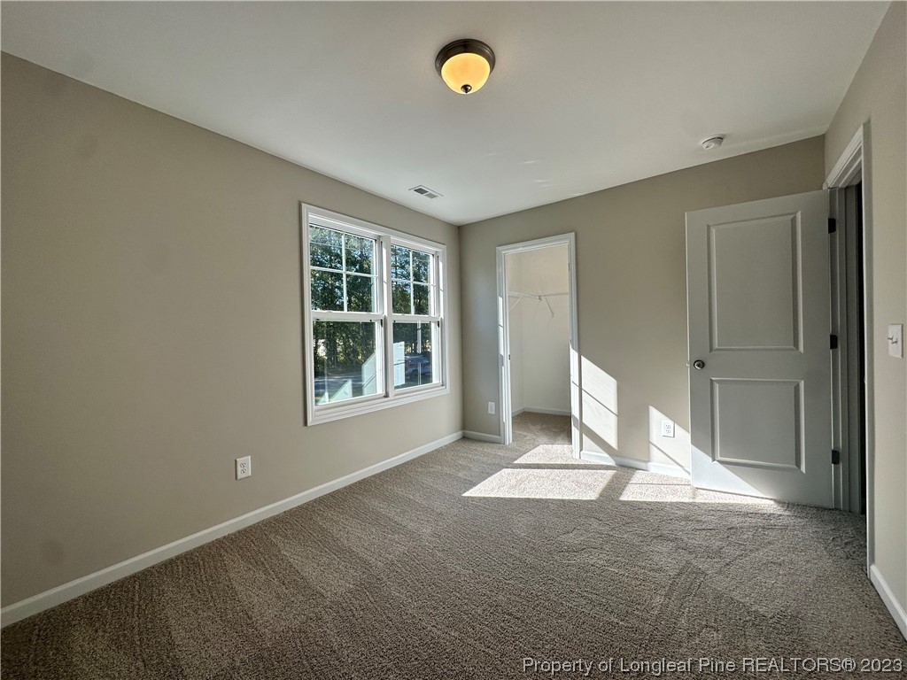 757 Britt Road St. Pauls, NC 28384 - Photo 20 of 25 a view of an empty room with a window