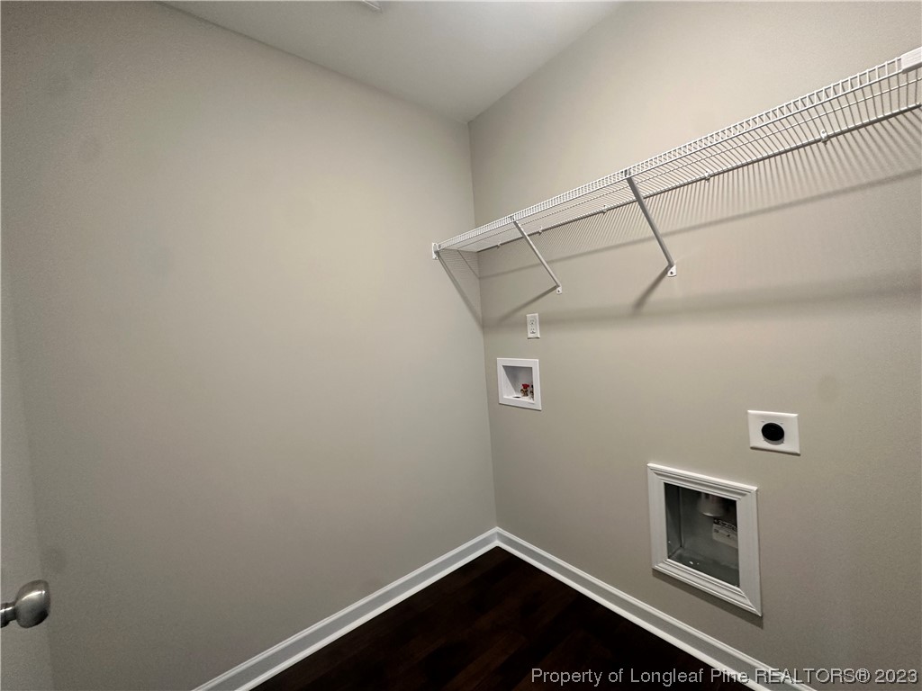 757 Britt Road St. Pauls, NC 28384 - Photo 23 of 25 a view of a small space with racks on the wall