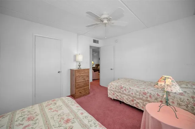 a view of a swimming pool with a lounge chairs