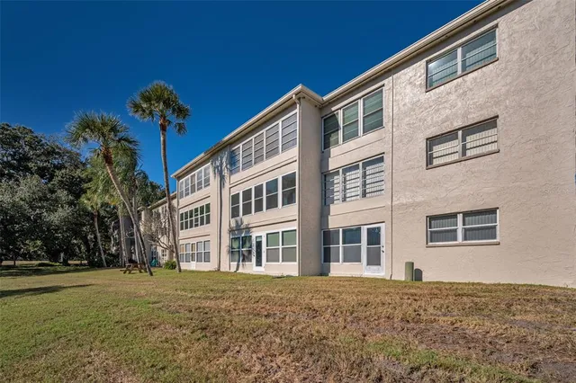 a workspace with furniture window and wooden floor