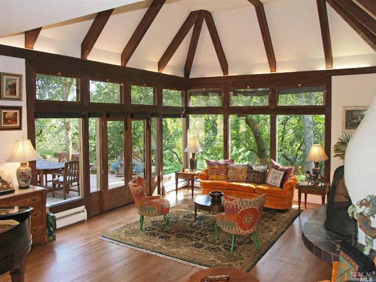 6335 Jamison Road Santa Rosa, CA 95404 - Photo 1 of 1 a living room with furniture and a floor to ceiling window