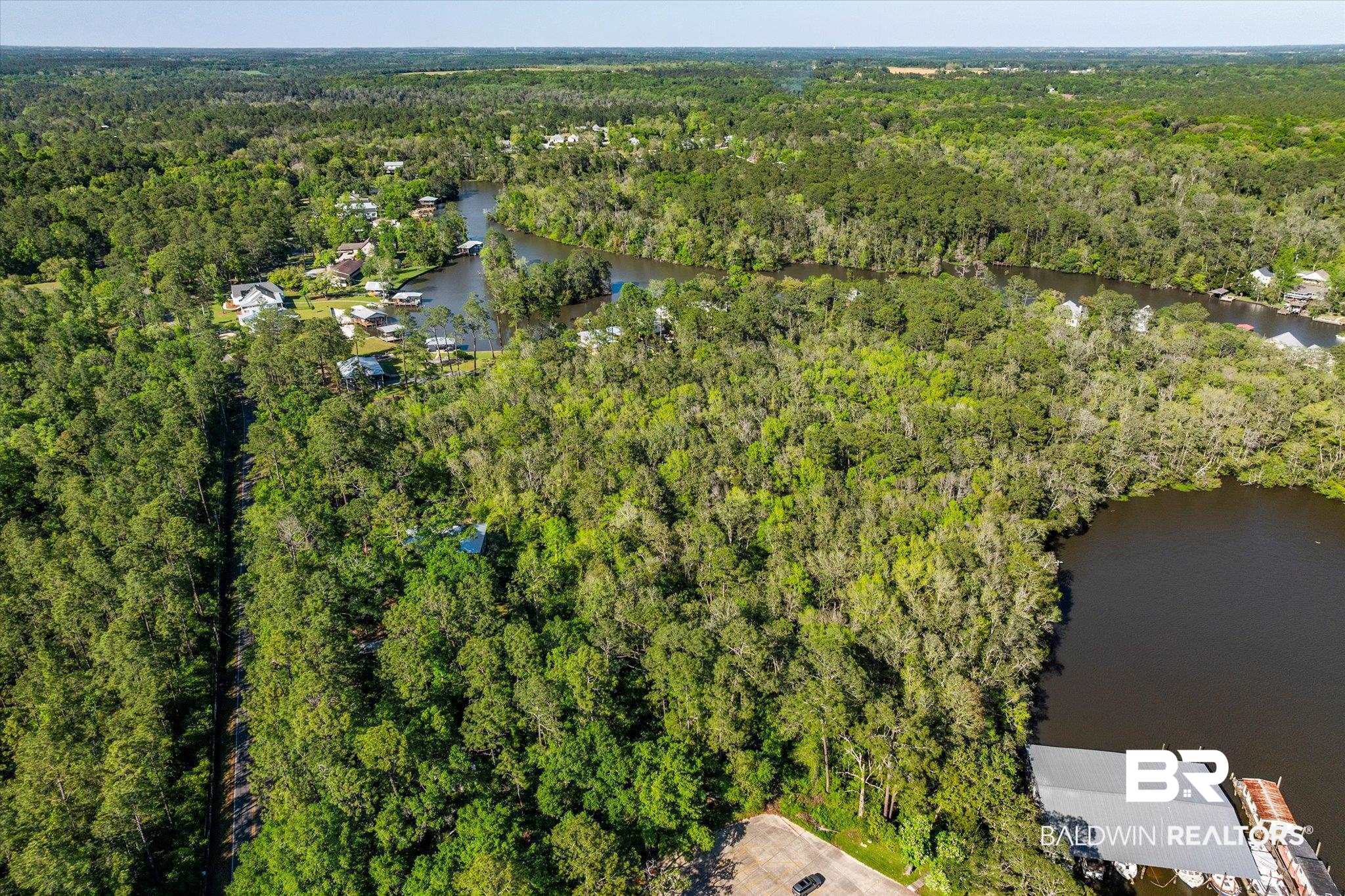 16620 Ferry Road Fairhope, AL 36532 - Photo 14 of 28 Aerial view with a wooded view and a water view