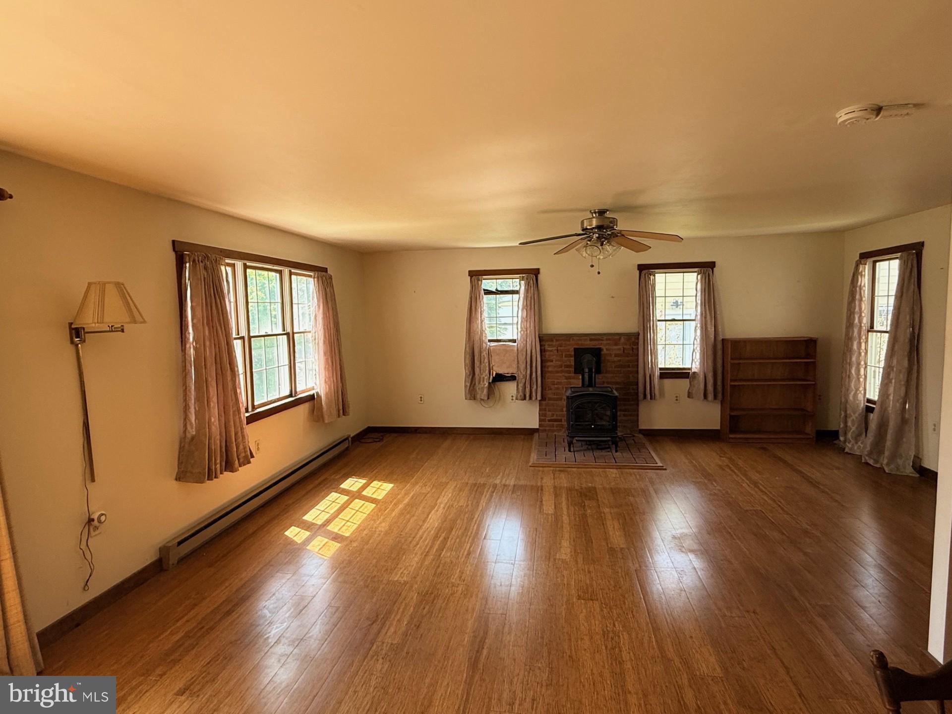 1831 Jill Road Willow Grove, PA 19090 - Photo 17 of 35 a view of livingroom with hardwood floor and a ceiling fan