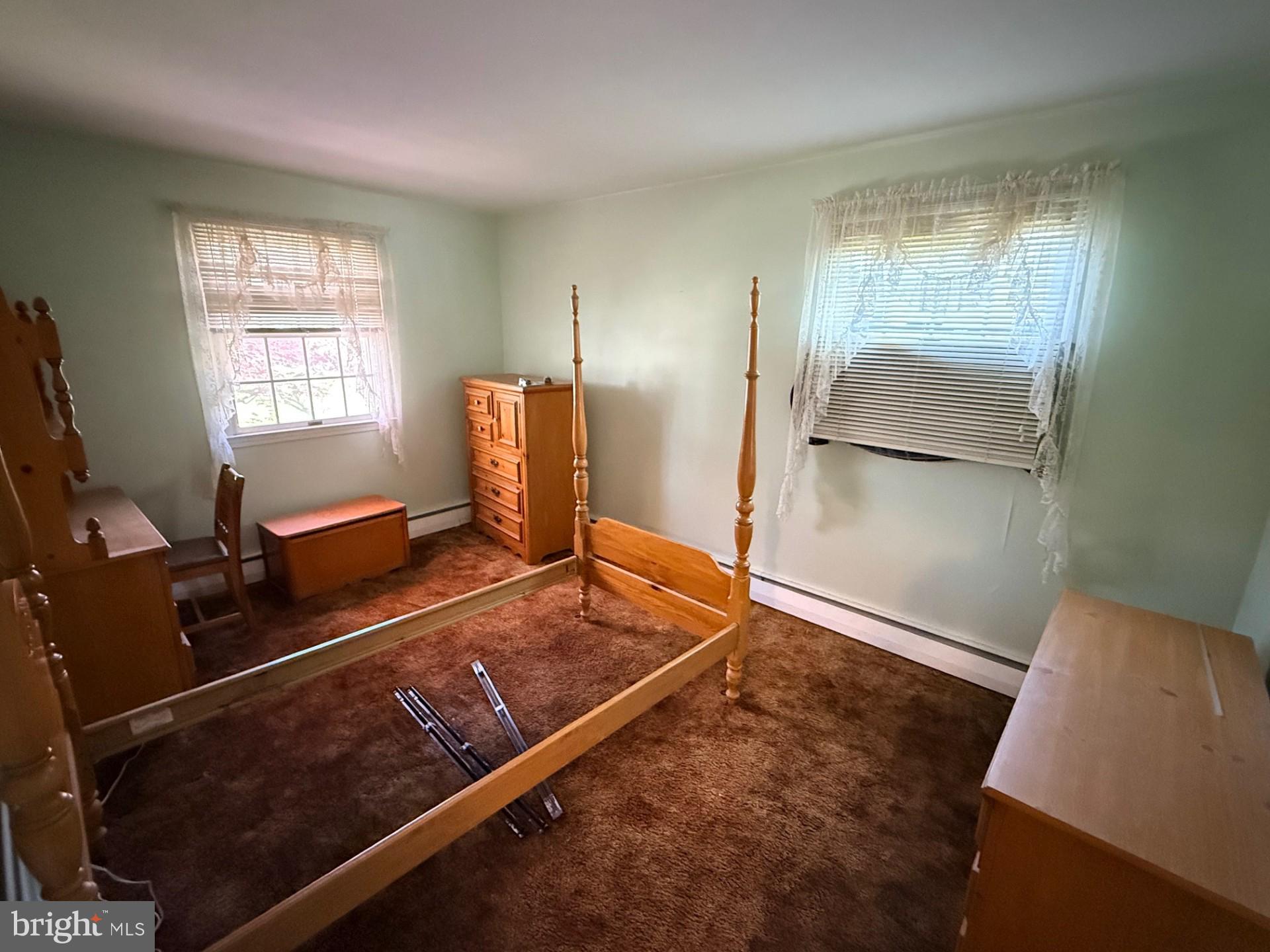 1831 Jill Road Willow Grove, PA 19090 - Photo 23 of 35 a room with wooden floor and gym equipment