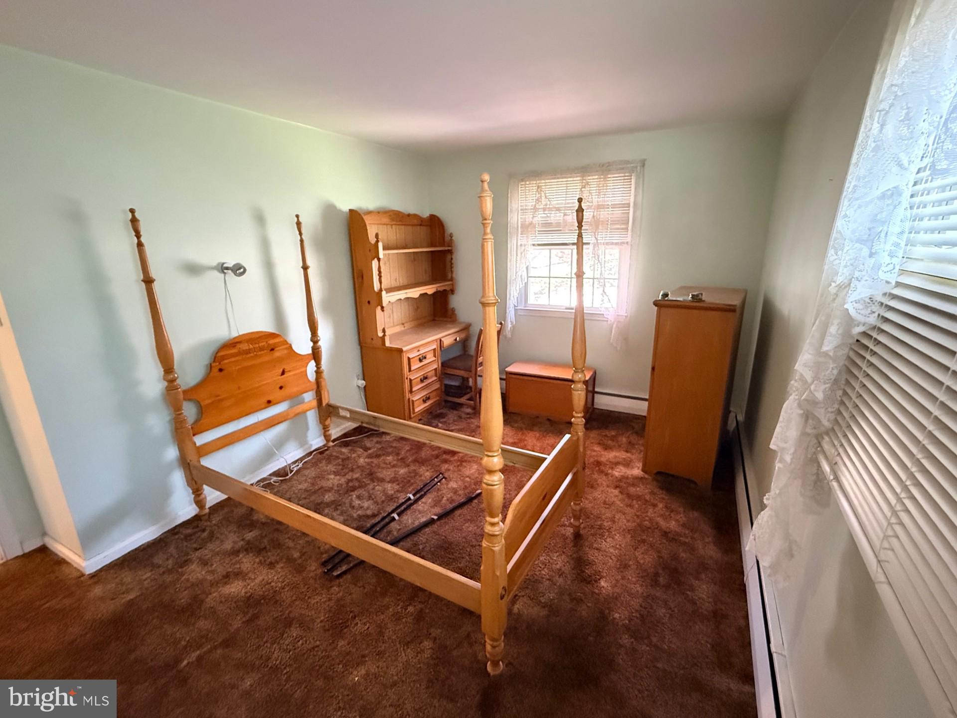 1831 Jill Road Willow Grove, PA 19090 - Photo 24 of 35 a room with furniture a rug and a window