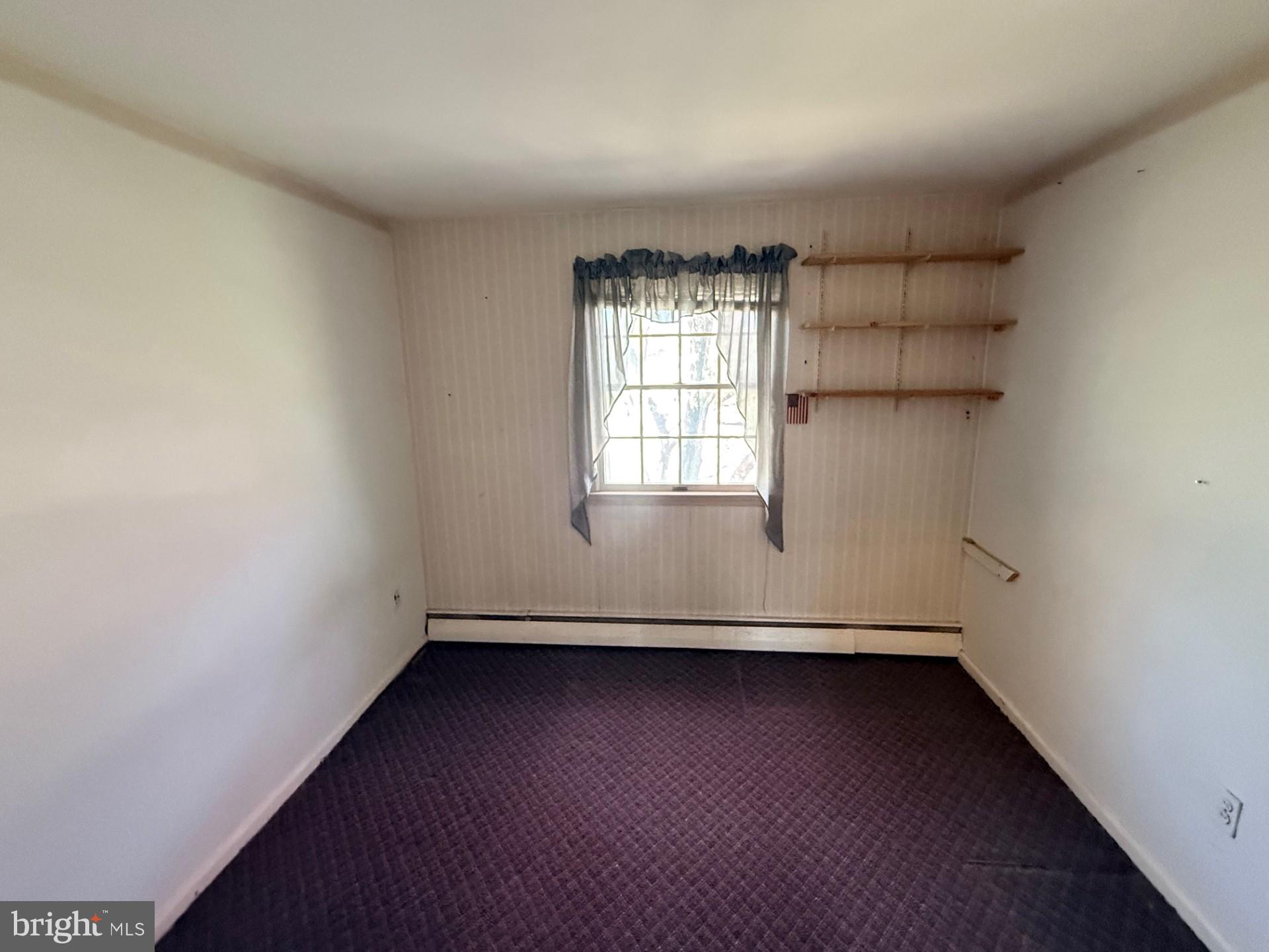 1831 Jill Road Willow Grove, PA 19090 - Photo 25 of 35 an empty room with a empty space and window