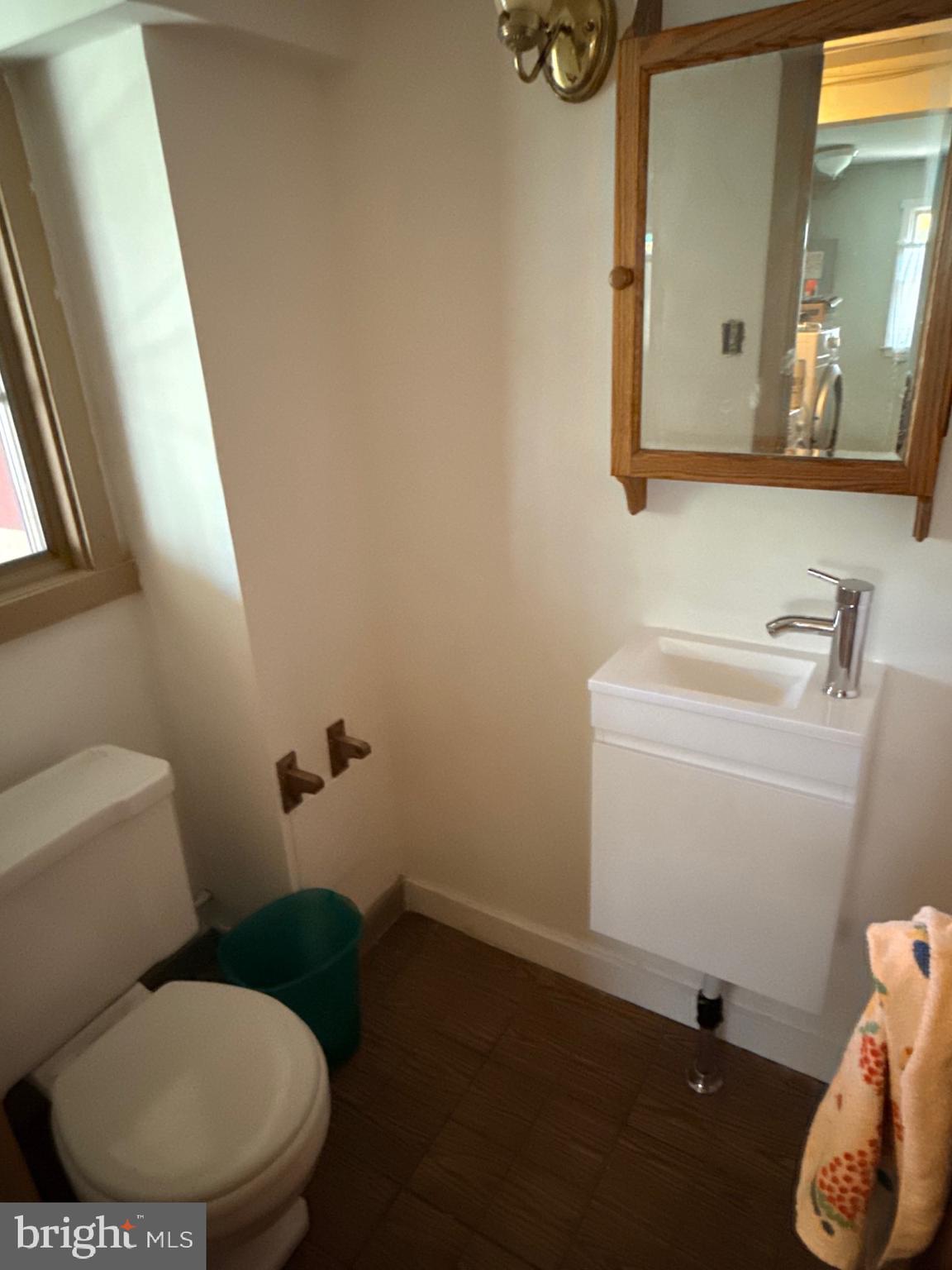 1831 Jill Road Willow Grove, PA 19090 - Photo 29 of 35 a white toilet sitting next to a bathroom sink
