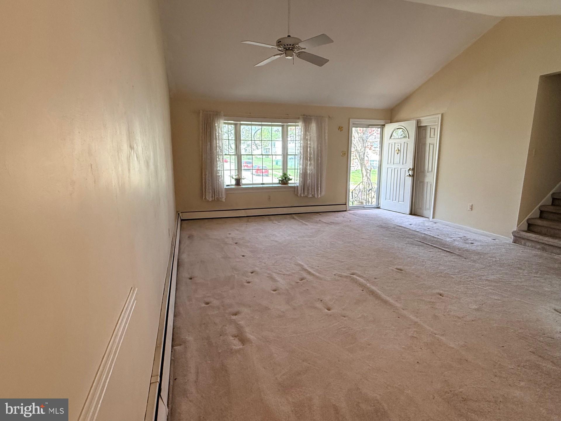 1831 Jill Road Willow Grove, PA 19090 - Photo 5 of 35 en empty room with windows and ceiling fan