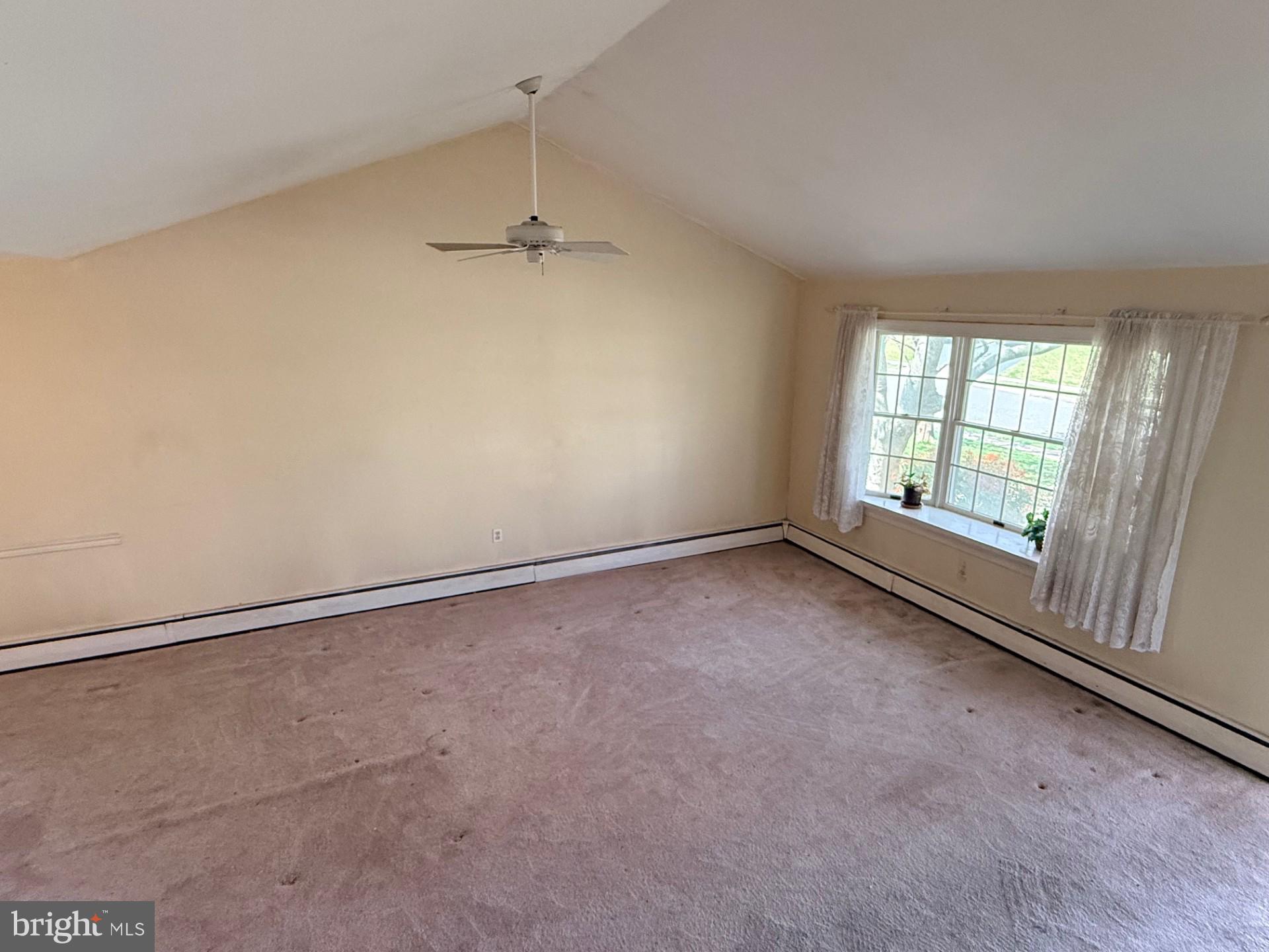 1831 Jill Road Willow Grove, PA 19090 - Photo 8 of 35 a view of an empty room with a window