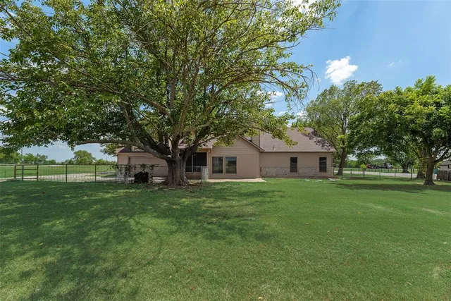 a house view with a garden space